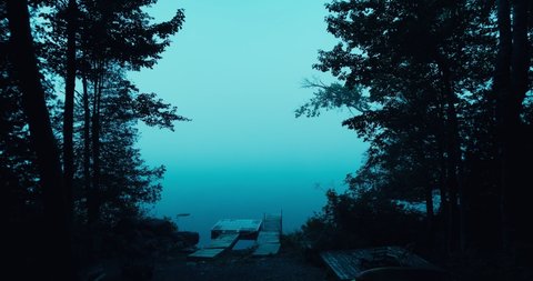 Eerie Foggy Morning in the Woods Over a Lake in Portland, Maine