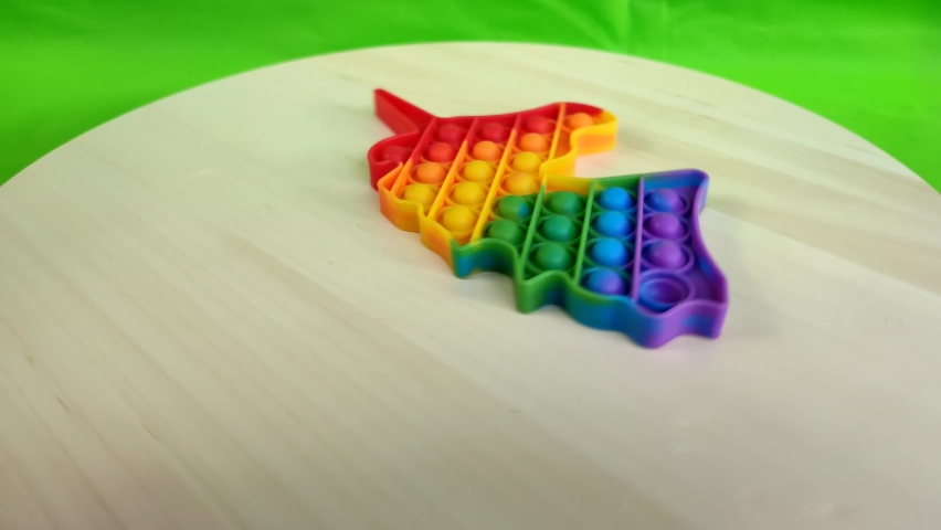 Popit trending toys for children, colorful toys with unicorn motifs