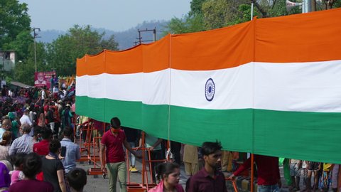 Haridwar, Uttarakhand.India- March 05 2021- Indian Flag Tiranga means Tricolor, unfurl during Indian biggest festival Kumbh Mela in Haridwar Uttarakhand India. Applepreres 422 CInetone. High quality