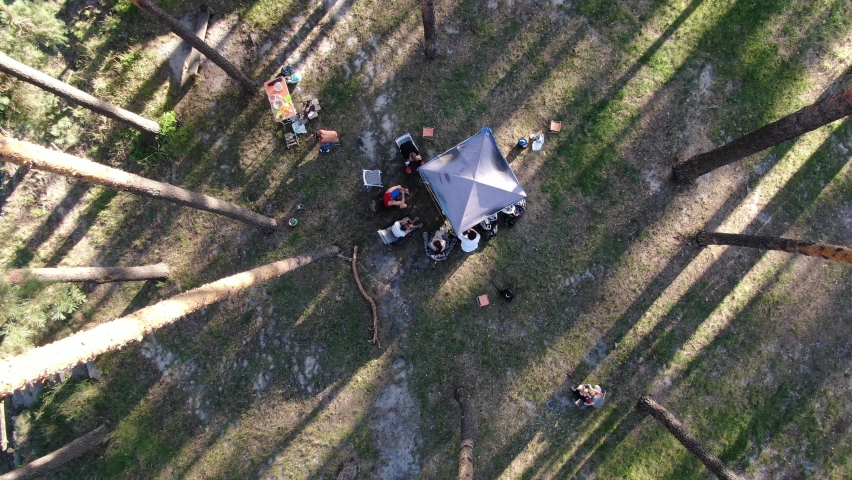 People are resting in the forest