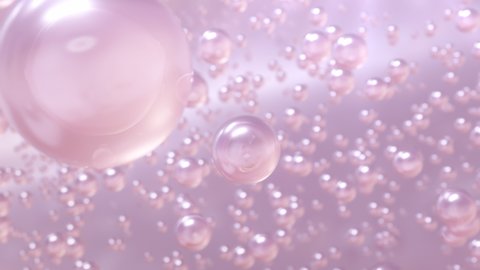 Macro shot of various Pink Gold bubbles in water rising up on light background. Super slow motion Beauty glossy Moisturizing bubble blobs or drops 3D animation find a special extract.