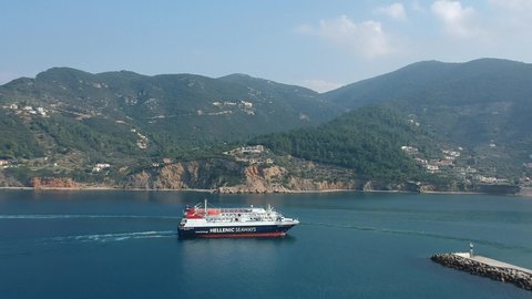 Skopelos, Greece - November 2019: Express Skiathos Ferry boat from Hellenic Seaways company arrives at the port of Skopelos island in Chora, Sporades, Greece