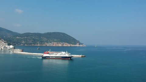 Skopelos, Greece - November 2019: Express Skiathos Ferry boat from Hellenic Seaways company leaving the port of Skopelos island in Chora, Sporades, Greece