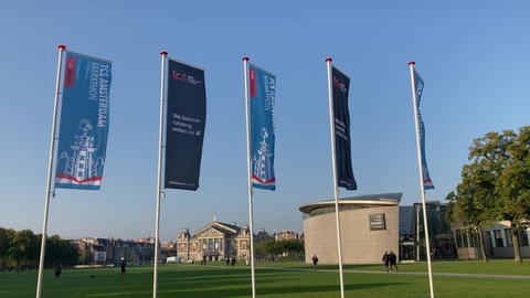 Amsterdam, The Netherlands - October 9, 2021: Banner flag of TCS Amsterdam Marathon event in museum square, next to rijksmuseum and van gogh museum Amsterdam