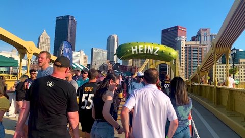 Pittsburgh , Pennsylvania , United States - 08 21 2021: People gathered on Andy Warhol Bridge during the Picklesburgh Food festival in Pennsylvania