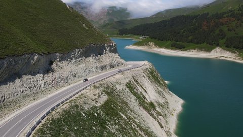 Car Moving along Kazenoy Am Lake in Chechen Republic, Russia. Aerial View