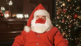 Happy Santa Claus take off medical mask during virtual meeting. End of the pandemic. Health care. Online chat conference. Remote communication. Close up portrait. Slow motion version 4K
