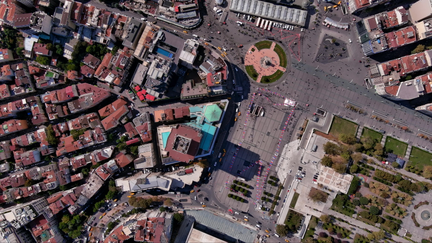 Taksim Square in Beyoglu district of Istanbul 4K bird's eye view of the French Consulate, Taksim Mosque, Hagia Triada Greek Church around Istiklal Street flying above central city center looking down
 Royalty-Free Stock Footage #1080474167