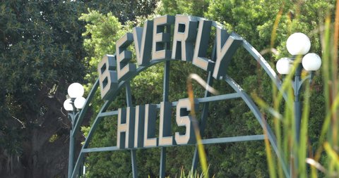 Beverly Hills, CA USA - July 2, 2021: The iconic Beverly Hills sign in front of the lily pond is a major tourist attraction
