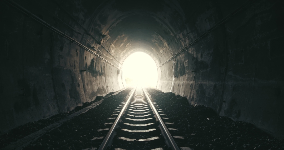 A railroad tunnel in the dark with a light at the end. Can represent achieving your goals, getting through problems and obstacles.