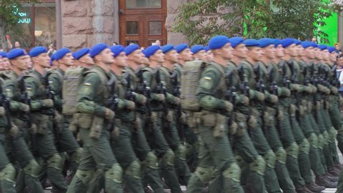 August 22, 2021, Kyiv, Ukraine
Ukrainian Army Soldiers are marching along the street. Independence Day of Ukraine parade preparation. Servicemen in uniform and with weapons event rehearsal.