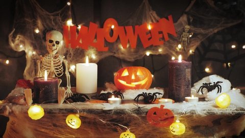 Halloween celebration. Halloween orange pumpkin on scary horror dark background. Halloween greetings. Traditional Halloween symbols with bright lights. Trick or treat