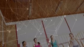 Animation of networks of connections over group of diverse basketball players at gym. global sport, connections and data processing concept digitally generated video. - Powered by Shutterstock - Get 15% off with code: PIKWIZARD15