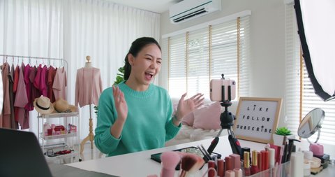 Asia woman micro influencer record live viral video camera at home studio Happy r fun talk speak advice review hobby in media Vlog selfie shoot enjoy work show smile teach like share app 库存视频