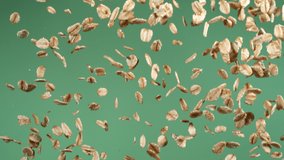 Oats falling in slow motion, green screen. Shot with Phantom Flex 4K camera. - Powered by Shutterstock - Get 15% off with code: PIKWIZARD15