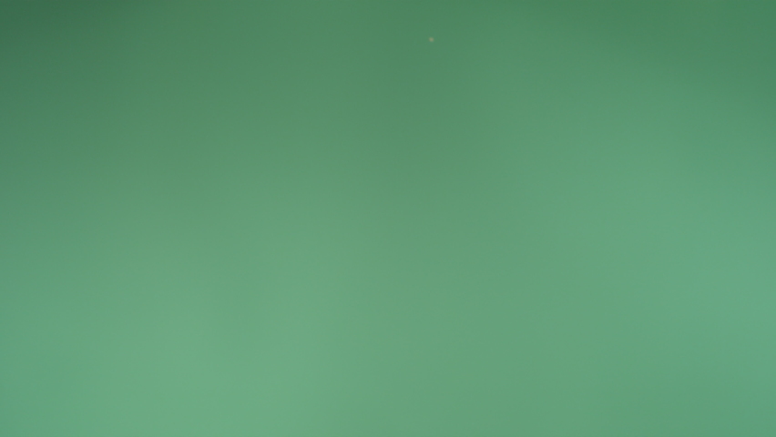 Peanuts falling in slow motion, green screen. Shot with Phantom Flex 4K camera. Royalty-Free Stock Footage #1080529667