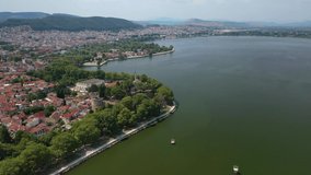 Aerial drone video of iconic castle and ancient city of Ioannina built in lake Pamvotida, Epirus, Greece