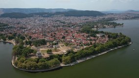Aerial drone video of iconic castle and ancient city of Ioannina built in lake Pamvotida, Epirus, Greece