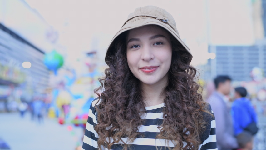 Tourism concept of 4k Resolution. Beautiful girls are having fun in an amusement park.