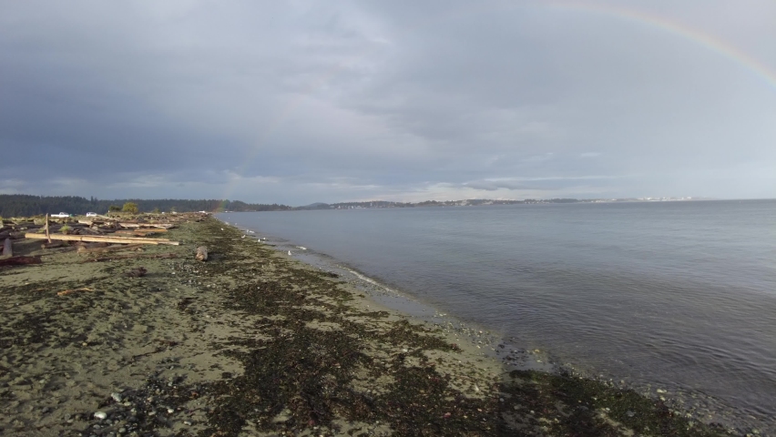Rainbow over the ocean. Rainbow over the pacific ocean near Victoria on Vancouver Island, British Columbia, Canada.