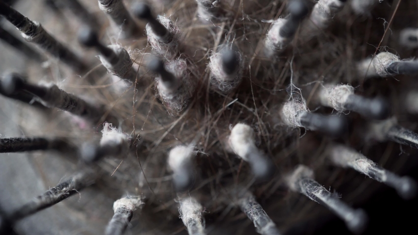 Dirty black hairbrush stock footage | Shutterstock HD Video #1080552476