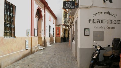 August 15, 2021, Seville, Andalusia, Spain - View of the narrow streets of the famous jewish neighborhood named "Barrio Santa Cruz", in the historical centre.