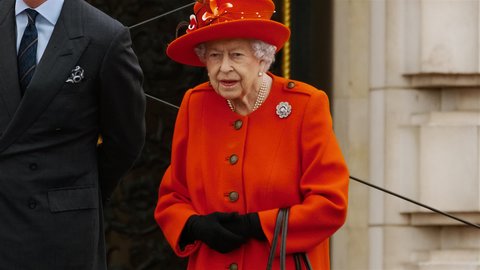 LONDON, circa 2021 - Her Majesty Queen Elizabeth II launches the Queen's Baton relay from Buckingham Palace,  London, England, UK, ahead of the 2022 Commonwealth games in Birmingham
