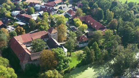Aerial view of hotel in medieval castle with rectangular arrangement of walls in Neuhaus near Wolfsburg, Germany