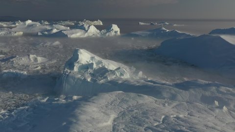 Aerial views of Glaciers and Red sail in Greenland