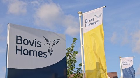 Bishop's Stortford, Hertfordshire. UK. October 11th 2021. Bovis Homes sign and flags in the Stortford Fields housing development.