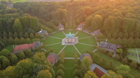 Drone Over Star Formation Of Complex Pavilions And Clemenswerth Palace In Lower Saxony Near Sogel, Germany. Aerial