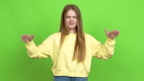 Teenager girl unhappy and frustrated with something over isolated background. Green screen chroma key