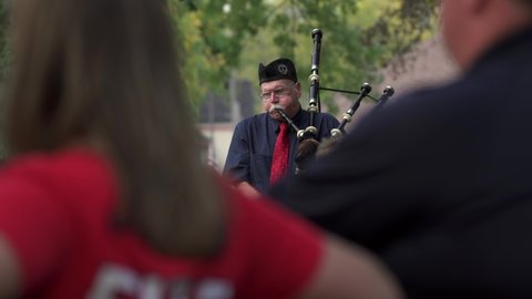 Madison, Wisconsin USA September,11 2021. Veteran playing bagpipes during 911 ceremony.