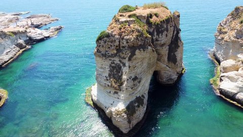 Raouche Rocks, Iconic Rock Formations In Beirut, Lebanon - aerial drone shot