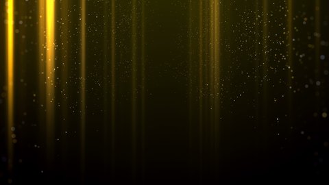 Gold wall background. Luxurious Christmas hanging gold garlands holiday party lights background. New Year or Christmas hanging garlands lights of gold glitter confetti flying and falling down. Glowing