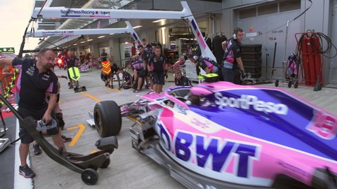 SOCHI, RUSSIA - 29 September 2019: Lance Stroll Racing Point Pit Stop training at  Formula 1 Grand Prix of Russia 2019, 4K High quality editorial footage
