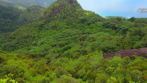 13.10.21 Mahe Seychelles Drone shot of the west cost of Mahe Island from the national park, view and heading towards grand anse district, the second longest beach of the Seychelles