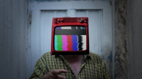 A Man with Old-fashioned TV set instead of Head and Test Pattern, Color Bars or Bad TV Signal Background.