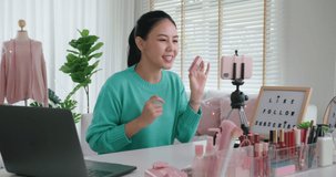 Asia woman micro influencer record live viral video camera at home studio. Happy youtuber fun talk speak advice review hobby in media. Vlog selfie shoot enjoy work show smile teach like share app.