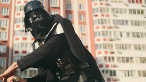 Close-up. Darth Vader waves a red sword. Star Wars saga character Russia Rostov-on-Don, September 28, 2021 
