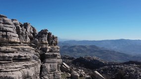Impressive Mountain top rocks in Torcal de Antequera seen from above, aerial drone view of karstik rocks in Spain