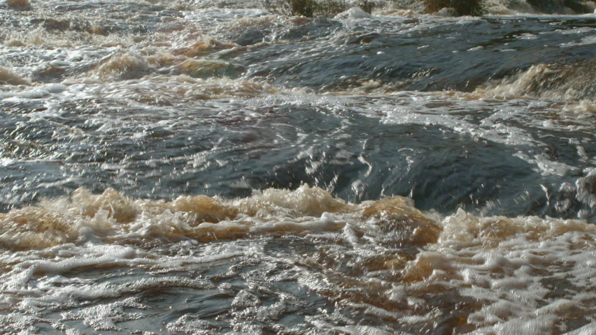 Close-up of powerfull river stream waterfall