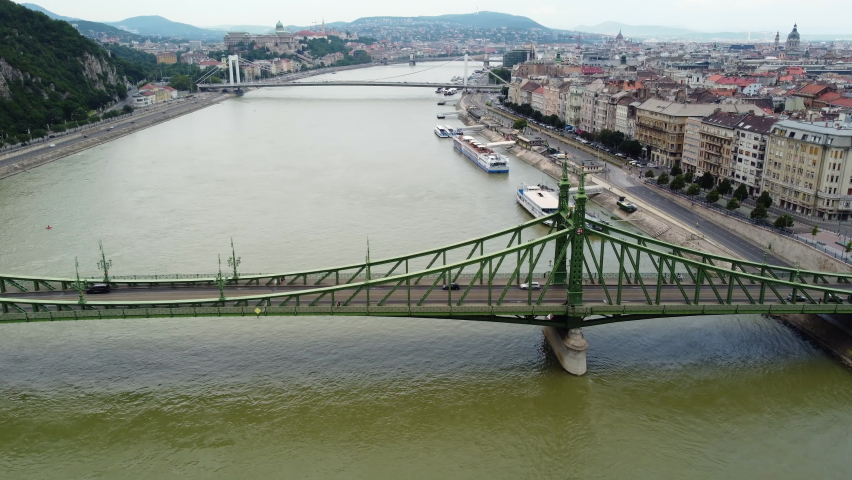 The Liberty bridge over the Danube river in Budapest, Hungary. Aerial view.