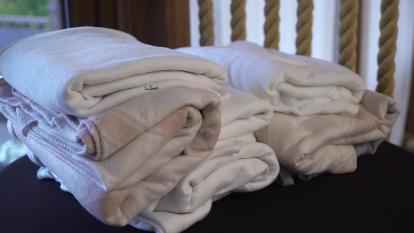 A stack of blankets for going out, for the terrace of outdoor restaurant or cafe.