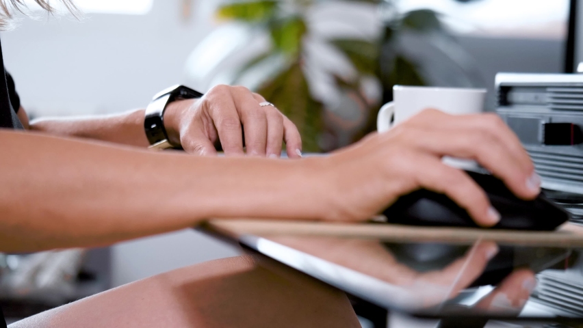 Woman hands working with mouse
