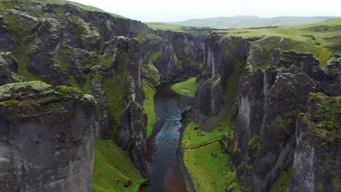 Landscape Of Fjaðrárgljúfur Canyon In South East Iceland - aerial drone shot
