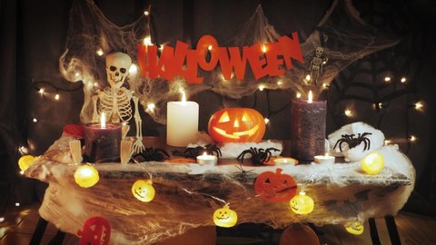 Halloween background. Celebrating Happy Halloween. Carved Halloween pumpkin with lights on background. Halloween decoration. traditional 