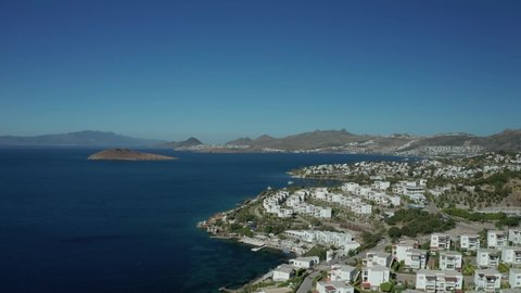 Amazing panoramic aerial 4k view from drone of beautiful bay of Bitez and Bodrum city in Bodrum on a bright and sunny day in Mugla province in Turkey