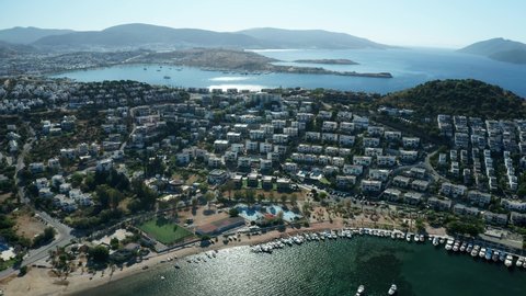 Amazing panoramic aerial 4k view from drone of beautiful bay of Bitez and Bodrum city in Bodrum on a bright and sunny day in Mugla province in Turkey