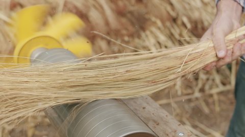 Farmer Making Traditional Straw Broom with sorghum, natural broom